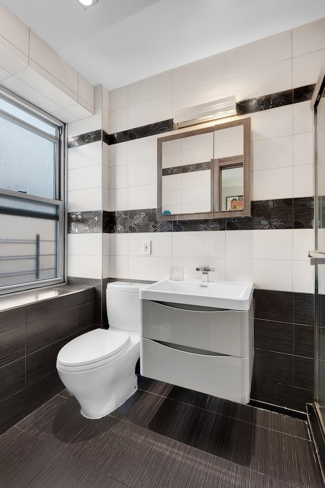 69-11 Yellowstone Blvd Unit A-51, New York City, NY 11375 - full bath featuring tile walls, toilet, vanity, and a stall shower