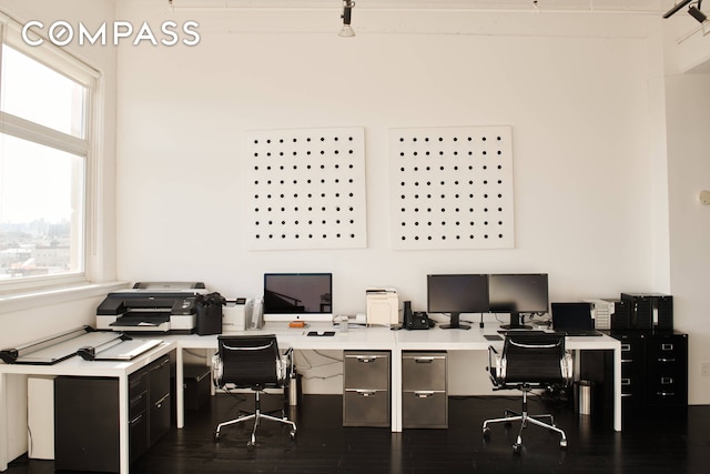 office area featuring dark wood finished floors and mail area