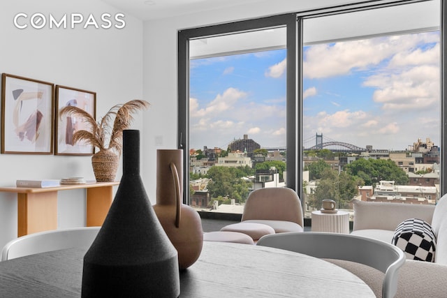 dining room featuring a view of city