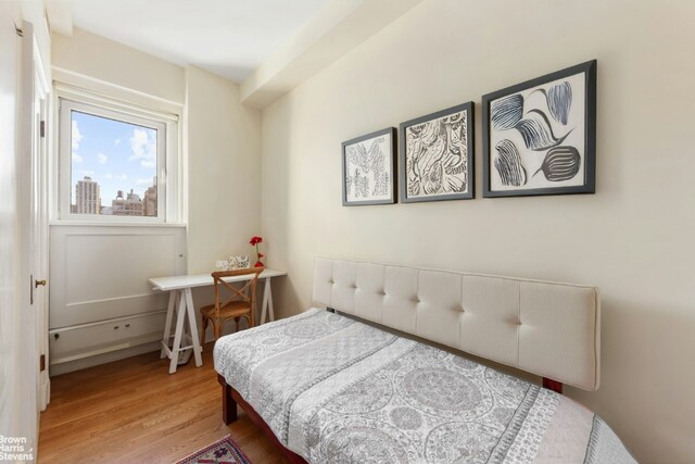 bedroom featuring hardwood / wood-style floors