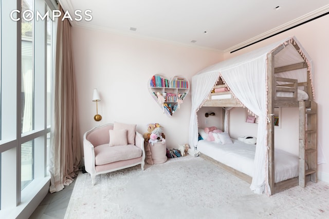 bedroom with ornamental molding and multiple windows