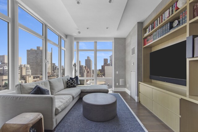 bedroom featuring built in desk and light colored carpet