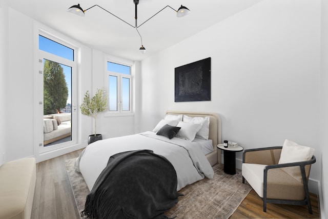 bedroom with wood-type flooring