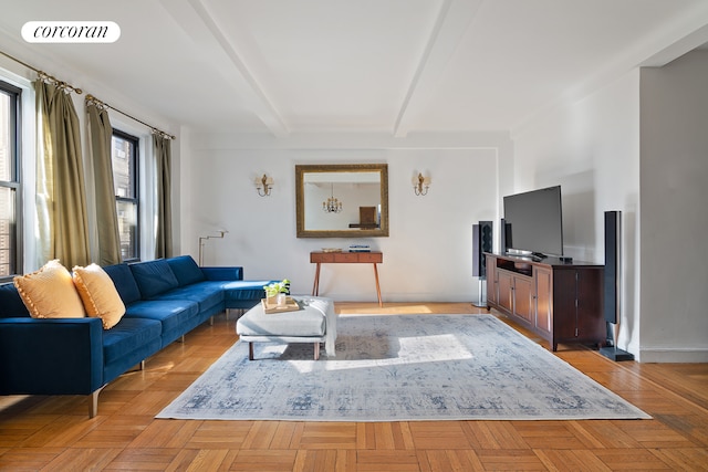 18 W 70th St Unit 8C, New York City, NY 10023 - living room with beamed ceiling and baseboards