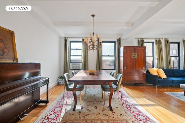 dining room featuring light hardwood / wood-style flooring, a chandelier, beam ceiling, and cooling unit