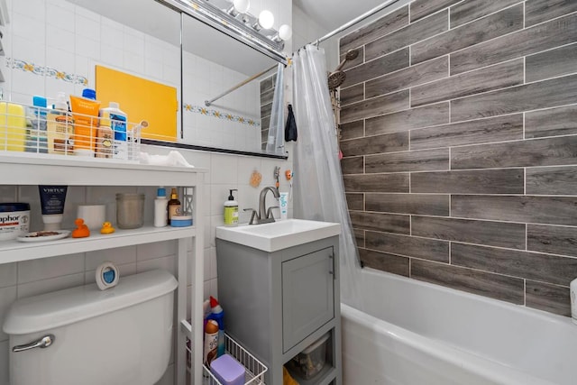 full bathroom featuring tile walls, decorative backsplash, vanity, toilet, and shower / bathtub combination with curtain