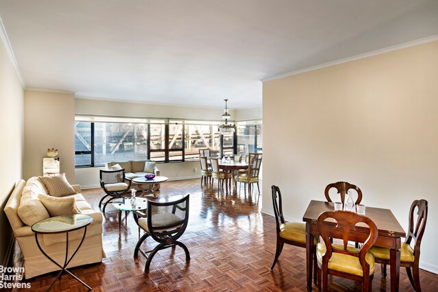 425 E 58th St Unit 8F, New York City, NY 10022 - living room with crown molding and baseboards