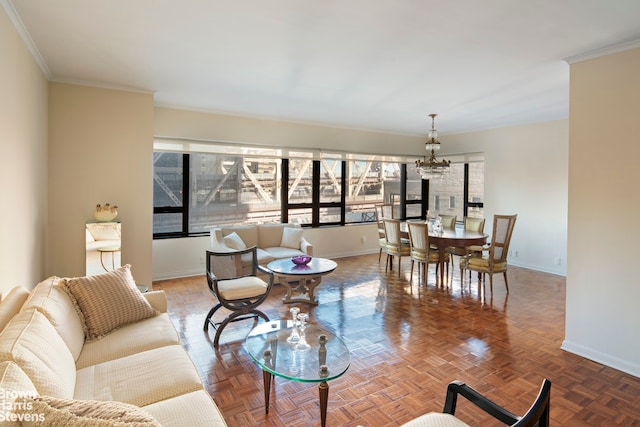 living room with an inviting chandelier, parquet floors, ornamental molding, and a healthy amount of sunlight