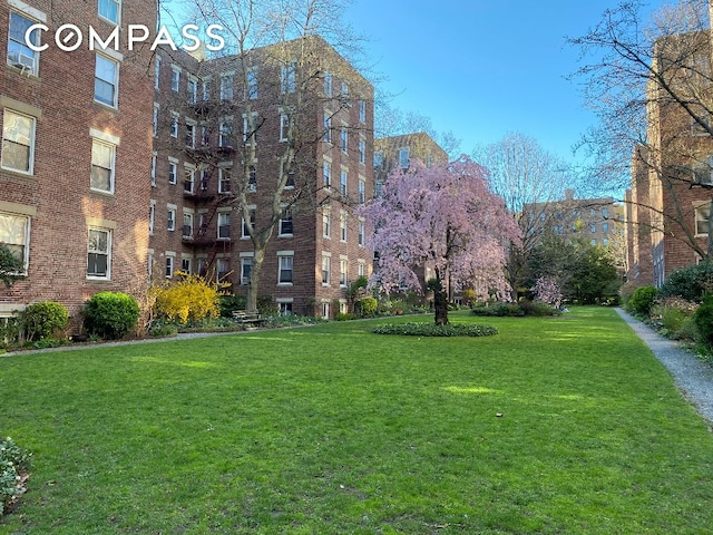 view of community with a lawn