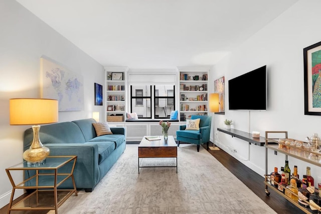 living room with hardwood / wood-style flooring