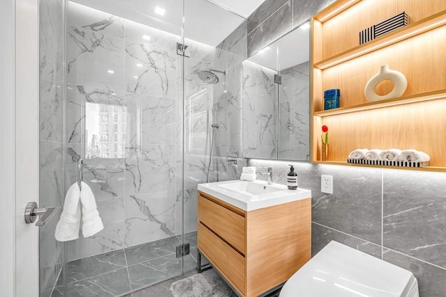 bathroom featuring vanity, tile walls, and walk in shower