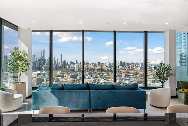 living room featuring floor to ceiling windows