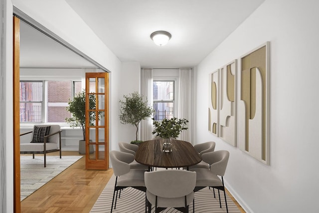 dining space with baseboards