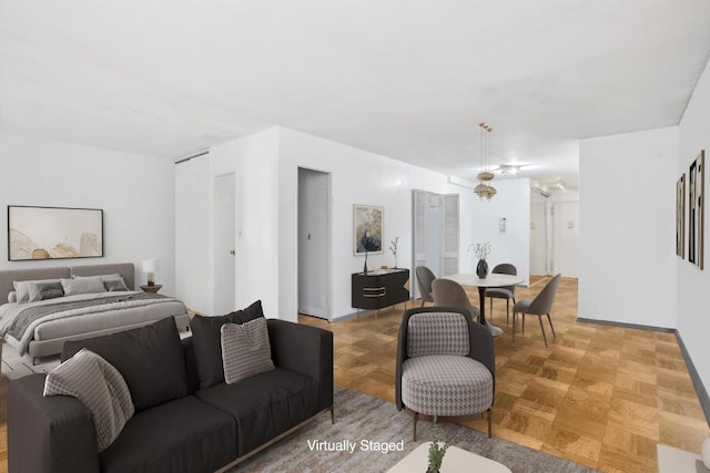 living room featuring parquet flooring