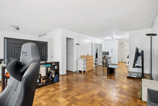 bedroom with light parquet floors