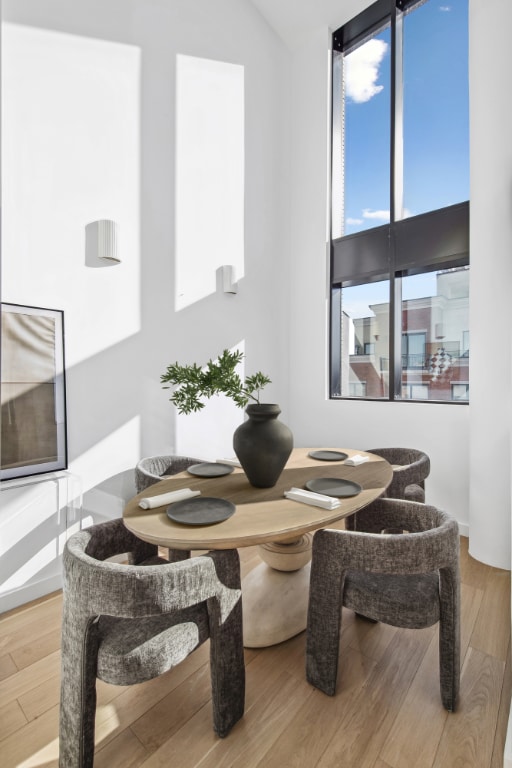 dining area with hardwood / wood-style flooring