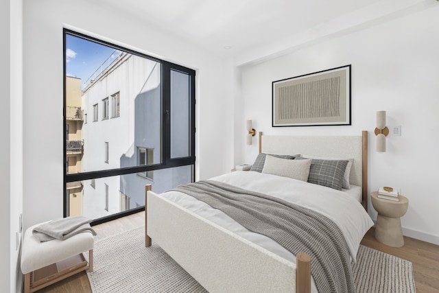 bedroom featuring hardwood / wood-style floors