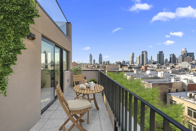 balcony featuring a city view