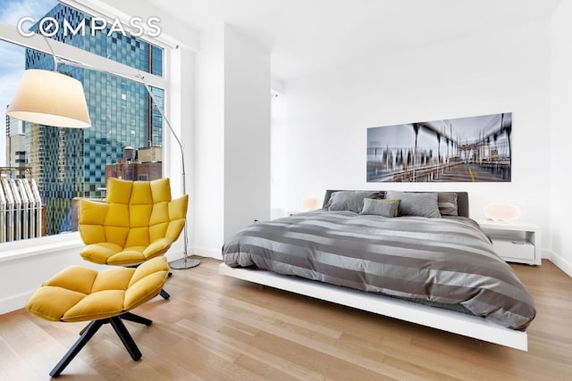 bedroom featuring wood-type flooring