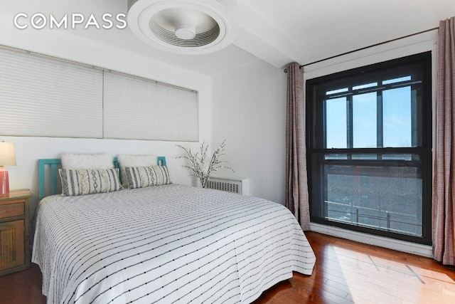 bedroom with wood-type flooring