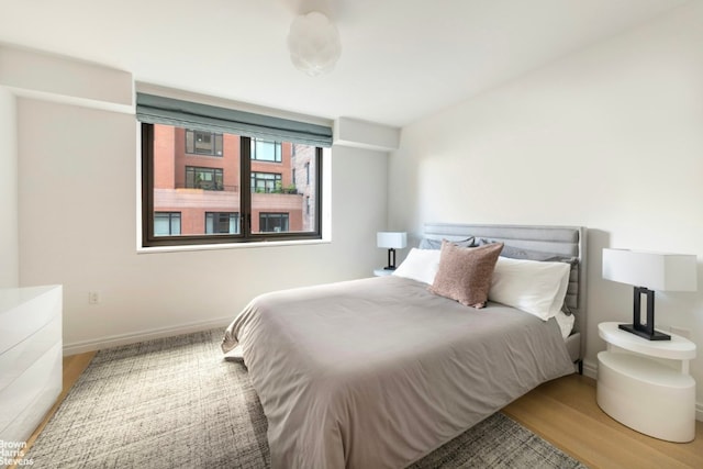 bedroom featuring wood-type flooring