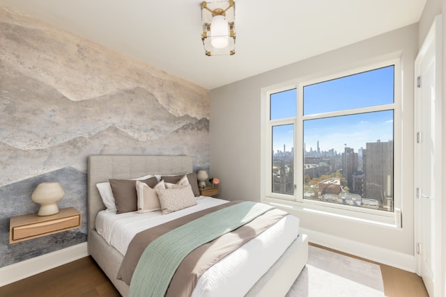 bedroom featuring hardwood / wood-style flooring