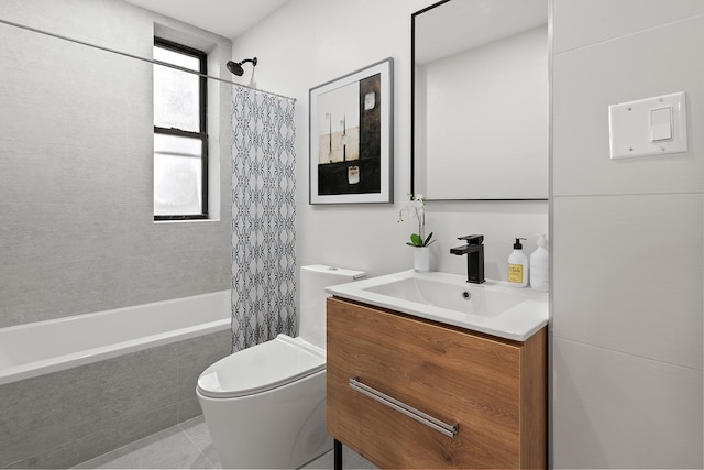 full bathroom with tile patterned floors, shower / bath combo with shower curtain, toilet, and vanity