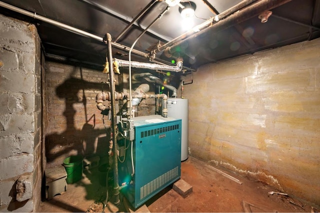 utility room featuring water heater