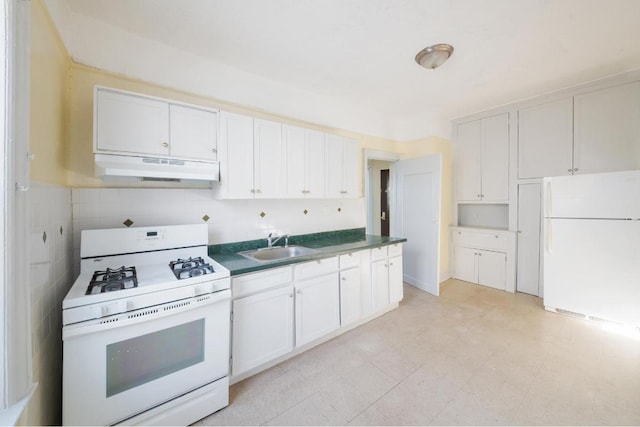 kitchen with white cabinetry, white appliances, and sink