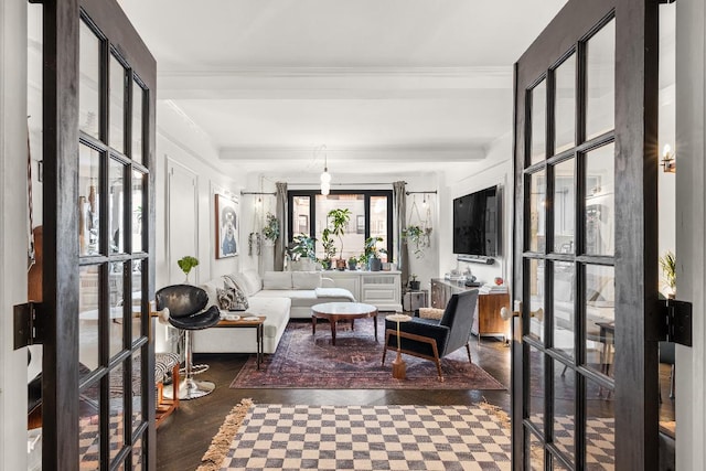 sunroom with french doors and beamed ceiling