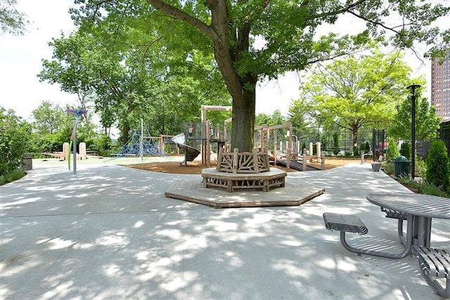 view of property's community featuring playground community