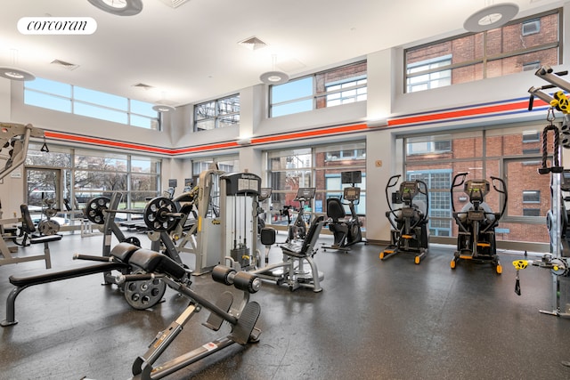 gym with visible vents and a wealth of natural light