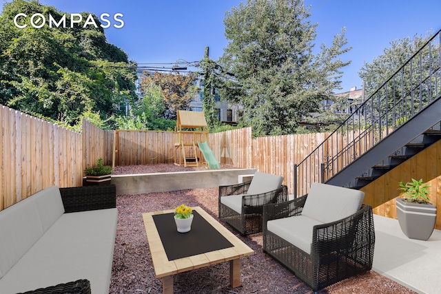 view of patio featuring a fenced backyard, outdoor lounge area, and a playground