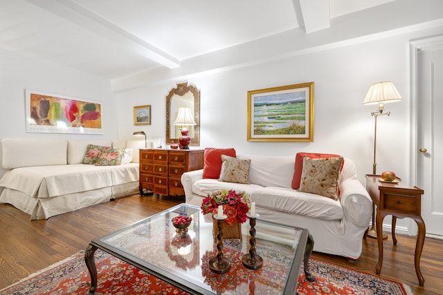 215 E 73rd St Unit 1G, New York City, NY 10021 - living room with beamed ceiling and wood finished floors