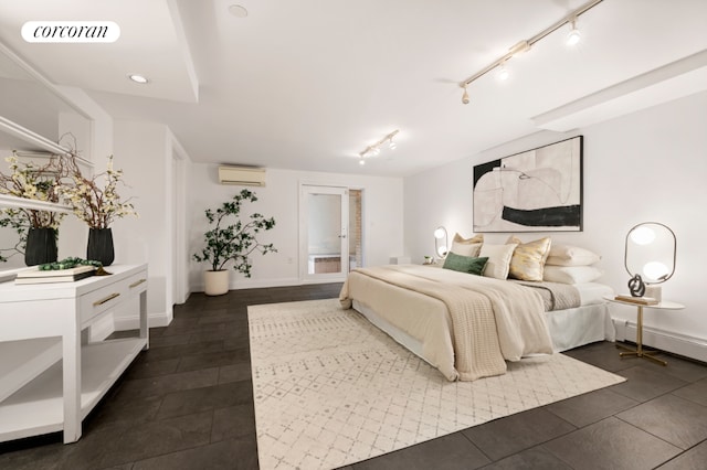 tiled bedroom featuring a wall mounted AC