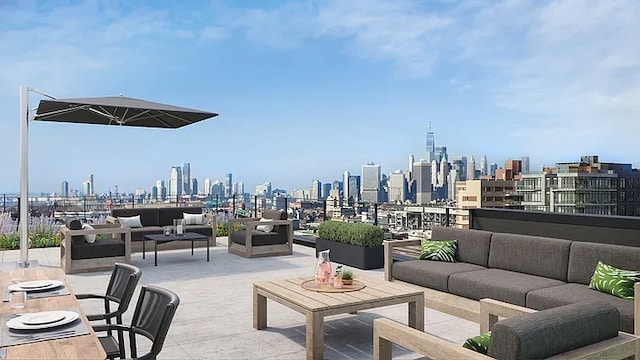 view of patio featuring outdoor lounge area and a city view