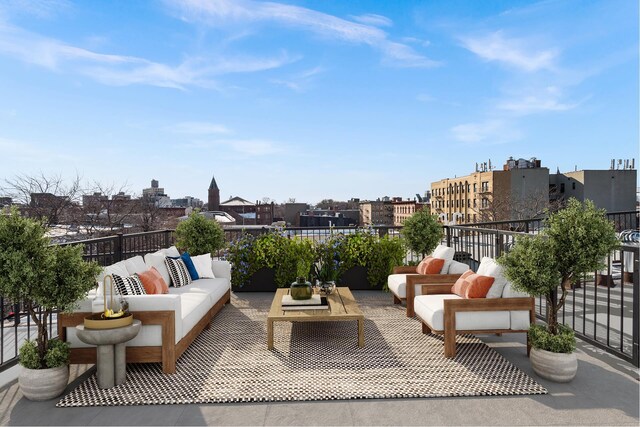 view of patio featuring an outdoor hangout area and a city view