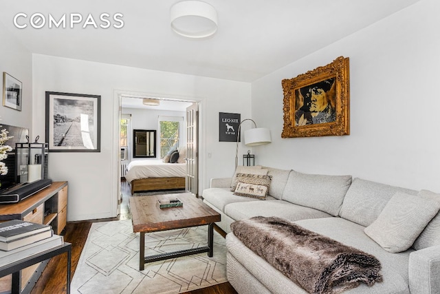 living room with dark hardwood / wood-style floors