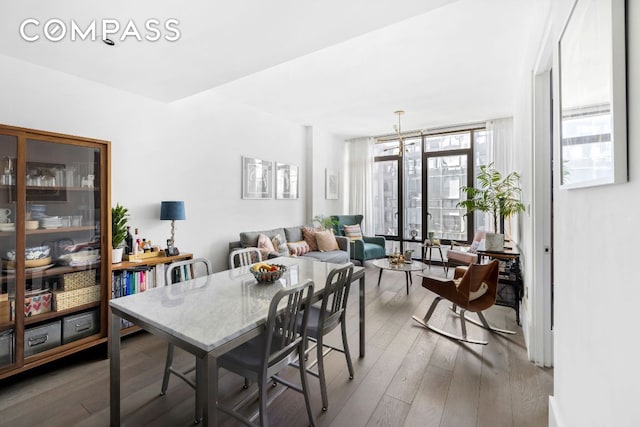 dining space featuring wood finished floors