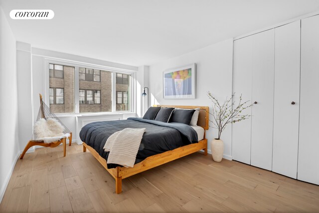 bedroom featuring light hardwood / wood-style floors