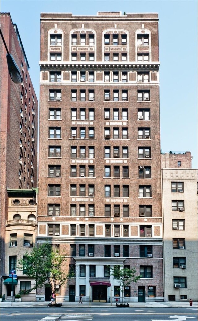 255 W End Ave Unit 4A, New York City, NY 10023 - view of property featuring a view of city and fence