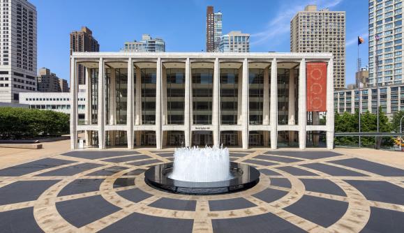 255 W End Ave Unit 4A, New York City, NY 10023 - bedroom with a decorative wall, hardwood / wood-style floors, and radiator