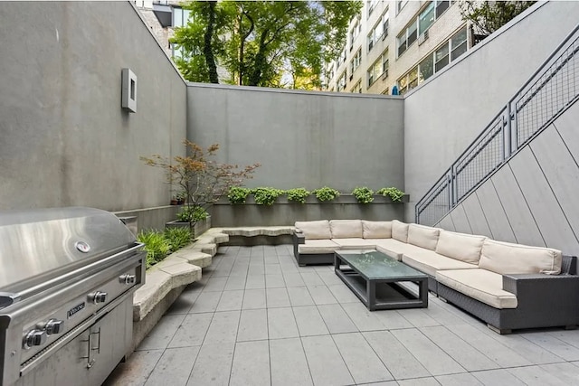 view of patio / terrace featuring a grill and outdoor lounge area