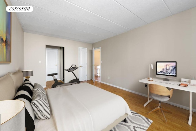 bedroom featuring hardwood / wood-style flooring