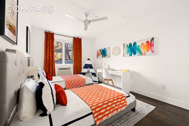 bedroom featuring dark wood-type flooring, cooling unit, baseboards, and ceiling fan