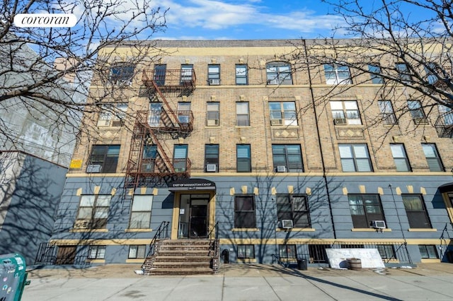 view of building exterior with cooling unit