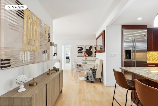 hall featuring light wood-style flooring