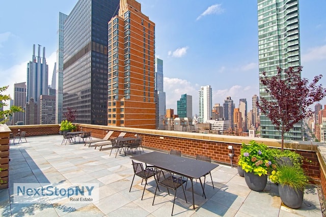 view of patio with a city view