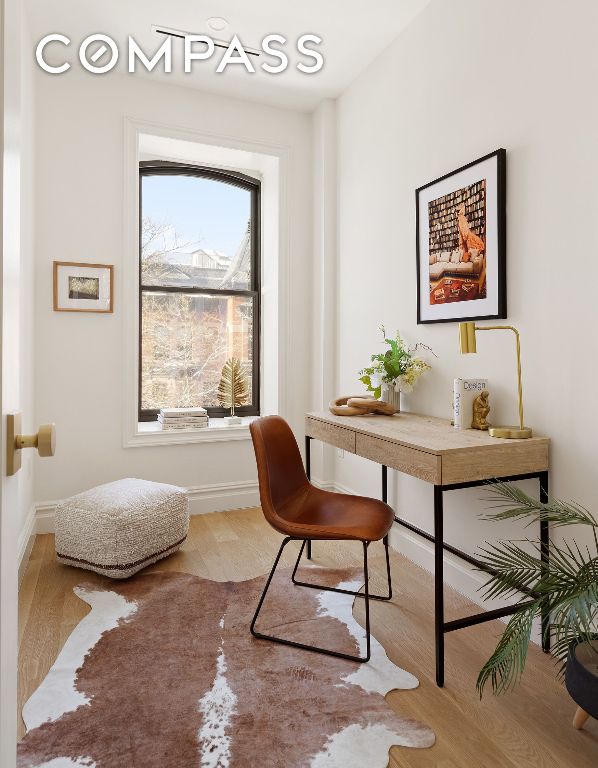 home office featuring light wood-type flooring