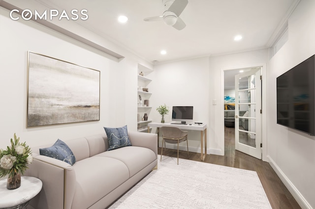 living room featuring ceiling fan, recessed lighting, wood finished floors, baseboards, and ornamental molding